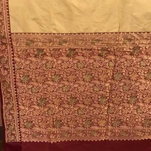 Silverish tan colored sari brand new red pallu